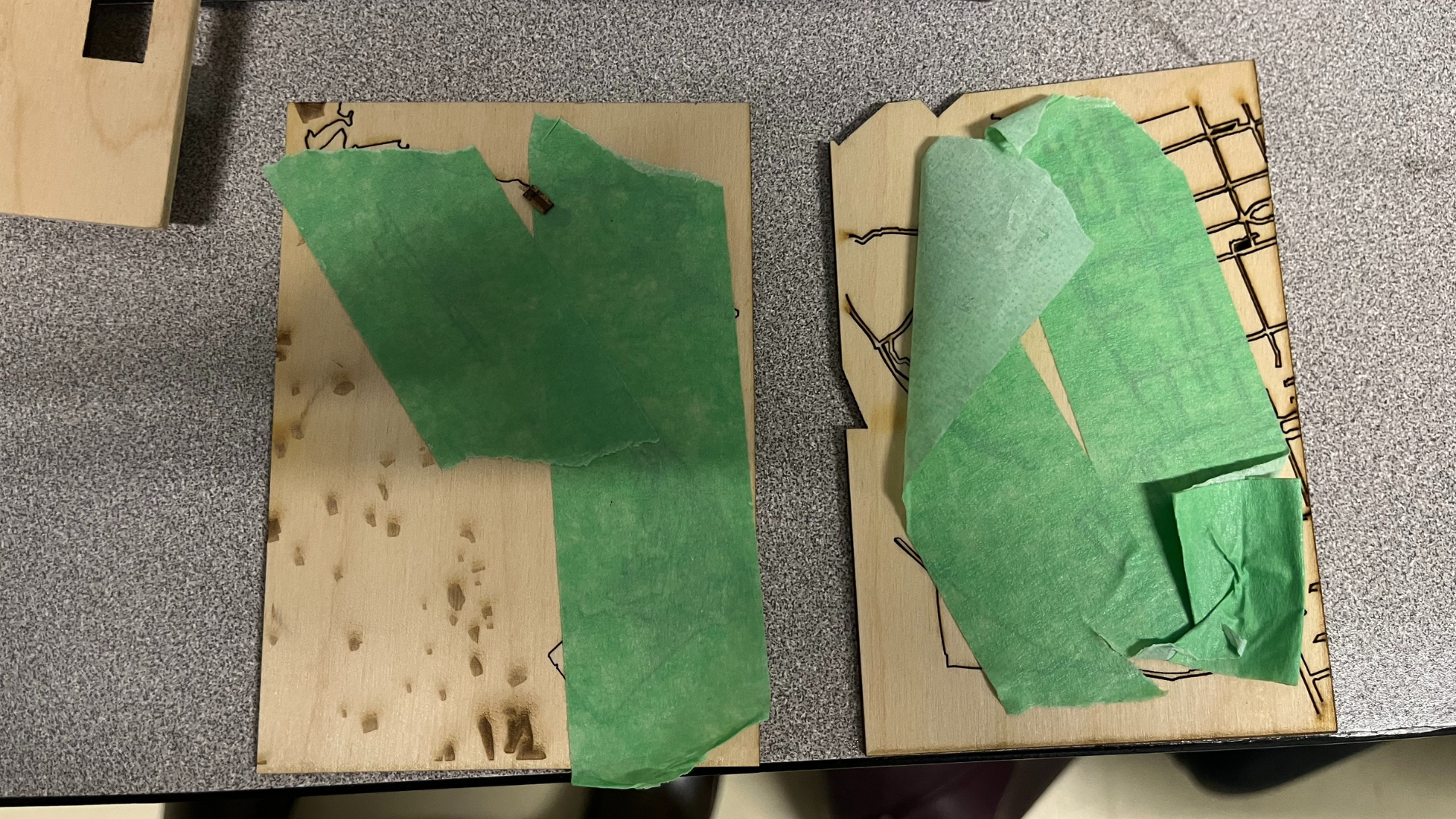 This photo shows one of my earlier test sections. Some of the thinner road lines broke during the cutting process, so we used painter’s tape to hold the pieces together temporarily for safety and to keep the test intact.