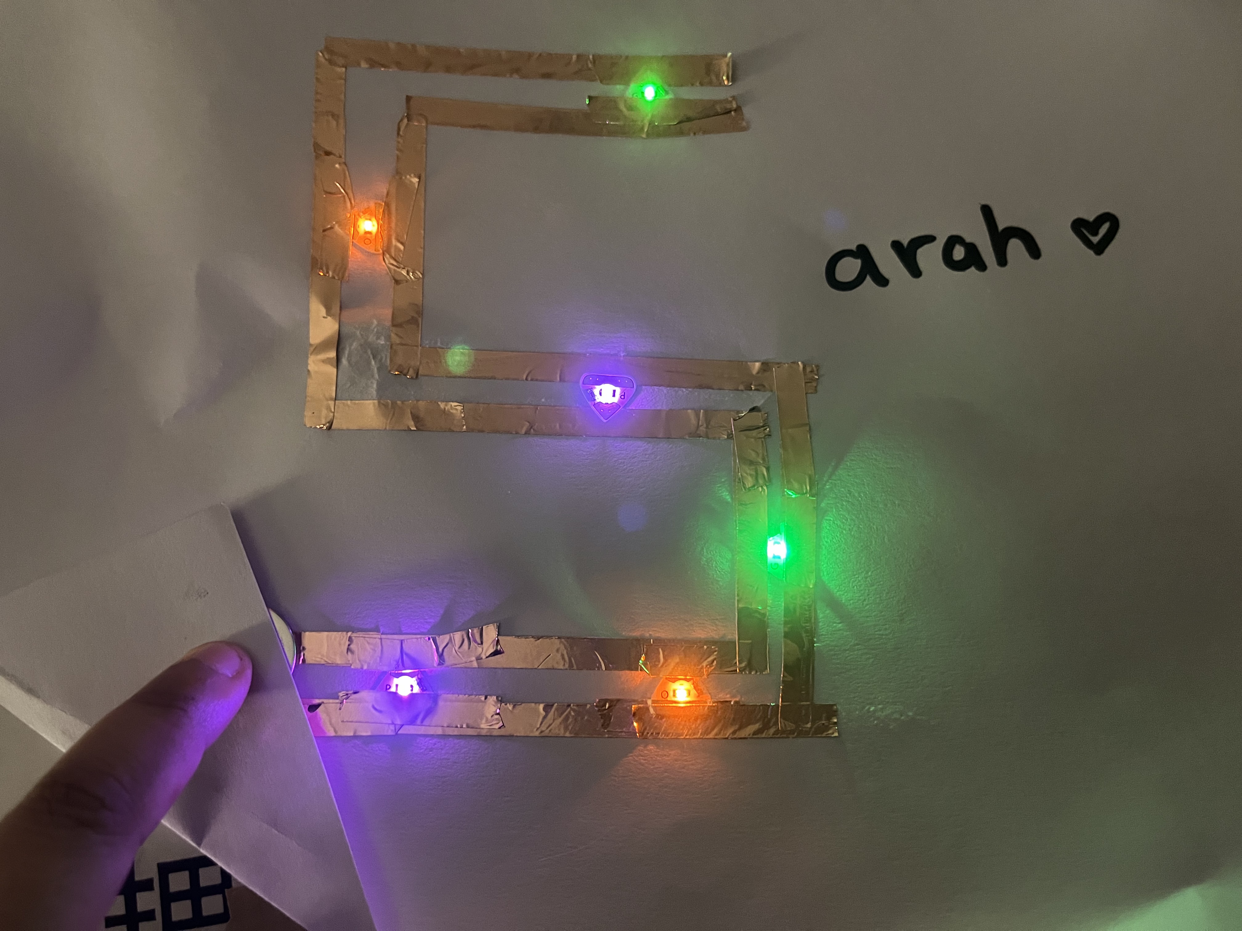 In order to make some lights not lose power, I had to add pressure by pressing the battery onto the conductive tape