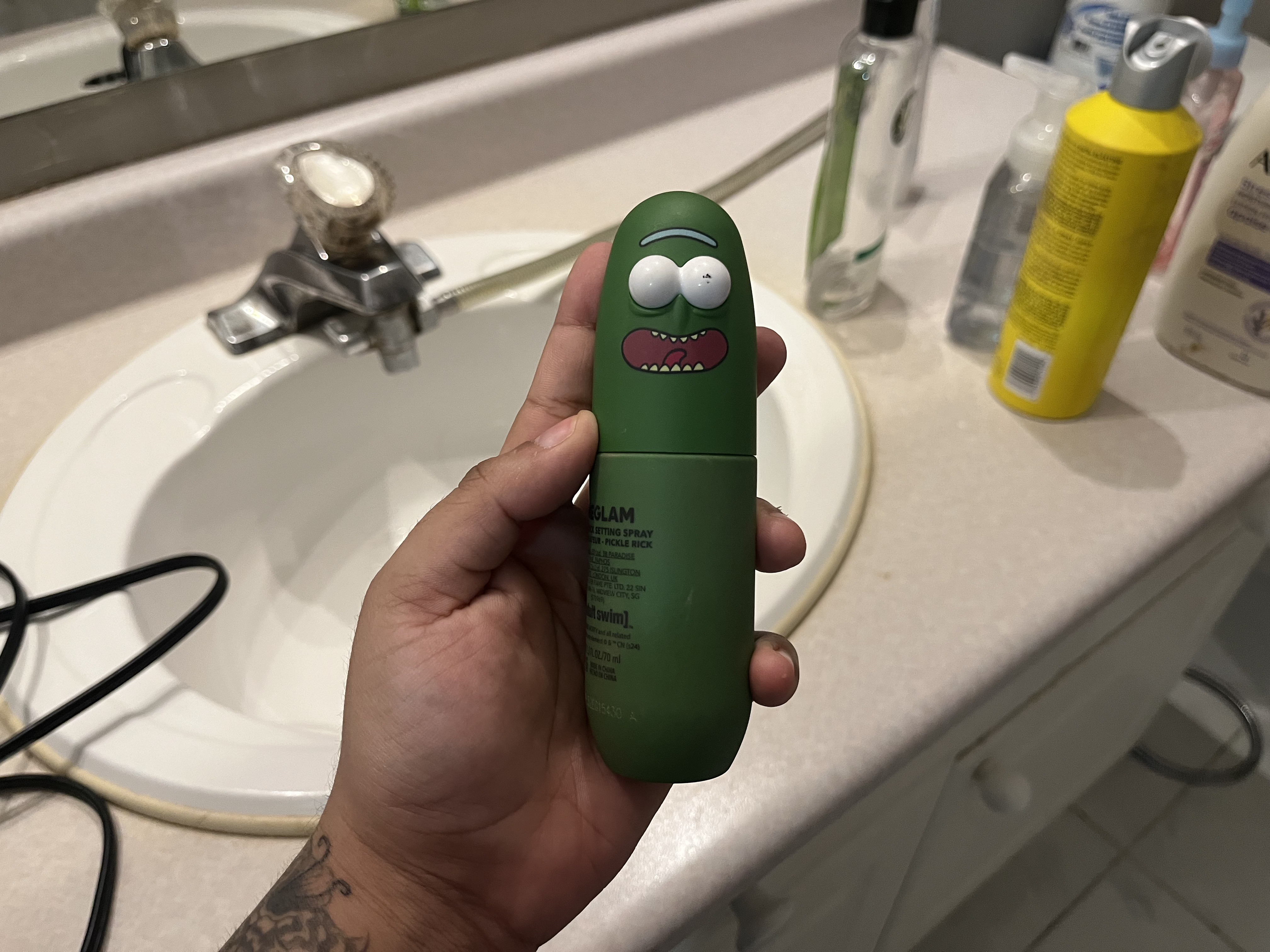 This is the sound of the setting spray being used repeatedly, creating a series of short, airy bursts with a fine mist spraying out
