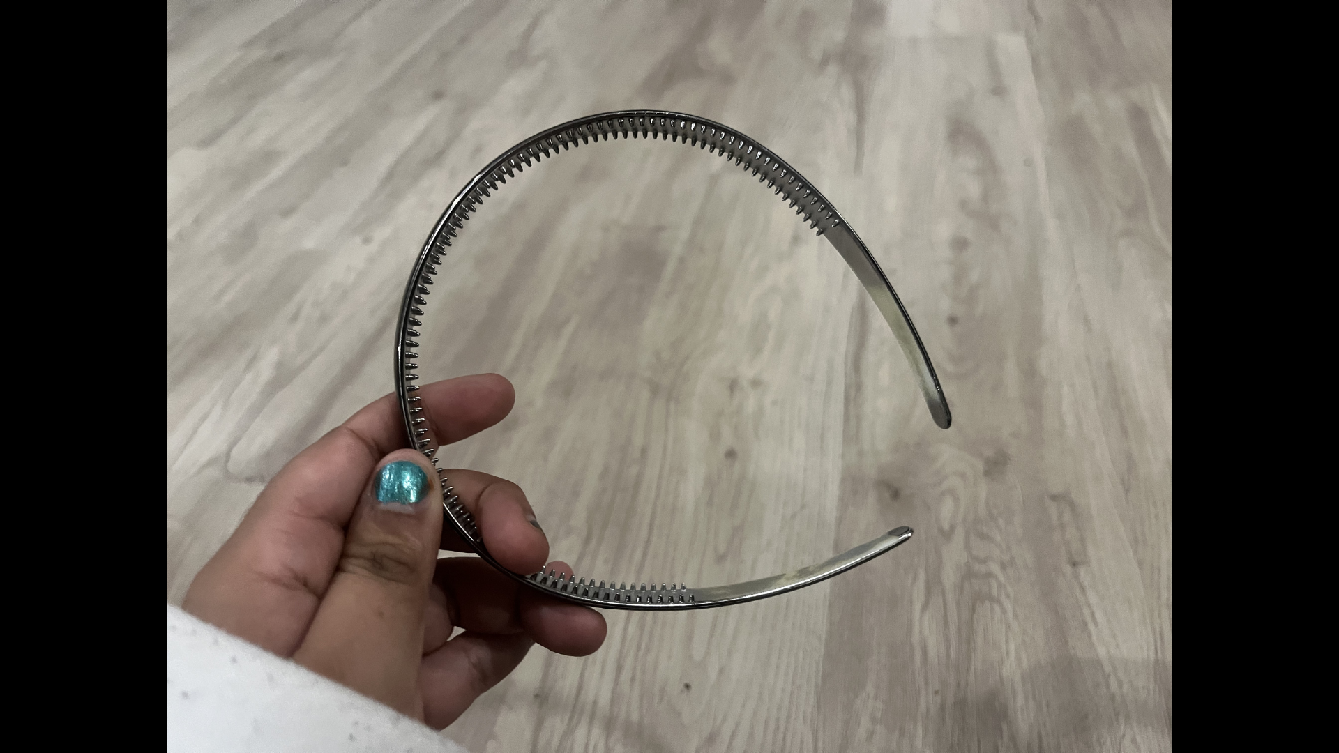 I tried adding conductive tape to the headband to make it more conductive and act as a connection to earth. It only worked when I held it, not when I wore it.